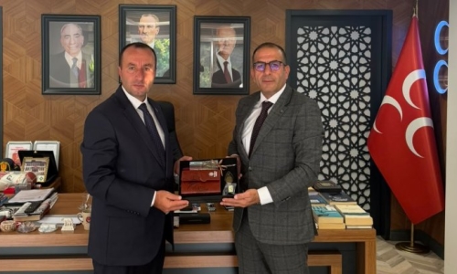 KOP, MHP İL BAŞKANI ÖZCANBAZ'I ZİYARET ETTİ